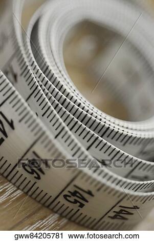 Close-up of a tape measure View Large Photo Image Stock Image - Close-up of a tape measure. Fotosearch