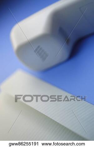 Close-up of a telephone receiver and an envelope View Large Photo Image Stock Image - Close-up of a telephone receiver and an envelope. Fotosearch