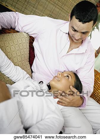 Close-up of a young man and a teenage girl looking at each other View Large Photo Image Stock Image - Close-up of a young man and a teenage girl looking at each other. Fotosearch