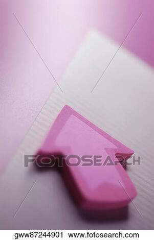 Close-up of an arrow sign on a sheet of paper View Large Photo Image Stock Image - Close-up of an arrow sign on a sheet of paper. Fotosearch