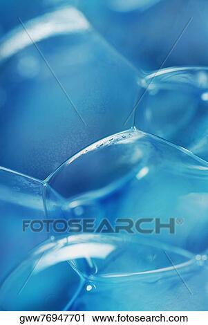 Close-up of bubbles in a glass View Large Photo Image Stock Image - Close-up of bubbles in a glass. Fotosearch