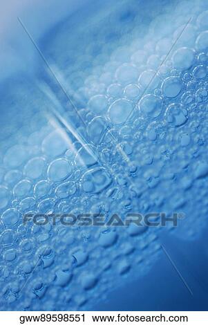 Close-up of bubbles in soda View Large Photo Image Stock Image - Close-up of bubbles in soda. Fotosearch