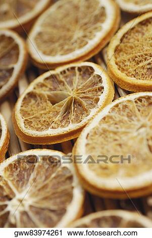 Stock Image - Close-up of dried slices of lemon. Fotosearch