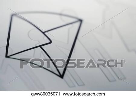 Close-up of envelope symbols on a sheet of paper chain dolls View Large Photo Image Stock Image - Close-up of envelope symbols on a sheet of paper chain dolls. Fotosearch