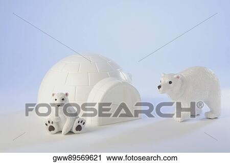 Close-up of figurines of two polar bears View Large Photo Image Stock Image - Close-up of figurines of two polar bears. Fotosearch