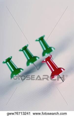 Close-up of four thumbtacks View Large Photo Image Stock Image - Close-up of four thumbtacks. Fotosearch
