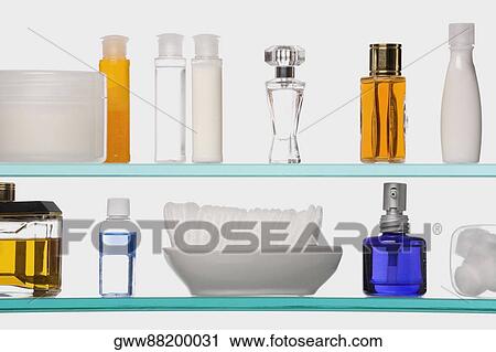 Close-up of grooming products on a shelf View Large Photo Image Stock Image - Close-up of grooming products on a shelf. Fotosearch