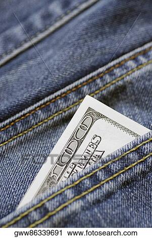 Close-up of one hundred dollar bill in a pocket View Large Photo Image Stock Image - Close-up of one hundred dollar bill in a pocket. Fotosearch