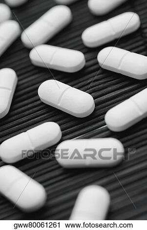Stock Image - Close-up of pills. Fotosearch