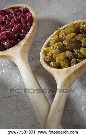 Close-up of raisin in wooden scoops View Large Photo Image Stock Image - Close-up of raisin in wooden scoops. Fotosearch