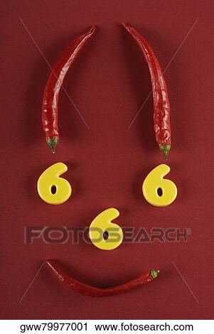 Close-up of red chili peppers and numbers making a human face View Large Photo Image Stock Image - Close-up of red chili peppers and numbers making a human face. Fotosearch
