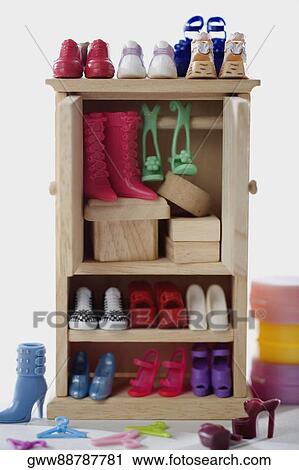 Close-up of shoes in a cabinet View Large Photo Image Stock Image - Close-up of shoes in a cabinet. Fotosearch