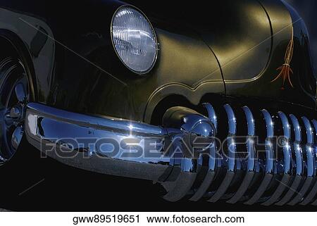 Close-up of the headlight of a car View Large Photo Image Stock Image - Close-up of the headlight of a car. Fotosearch