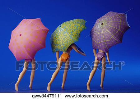 Close-up of three dolls View Large Photo Image Stock Image - Close-up of three dolls. Fotosearch