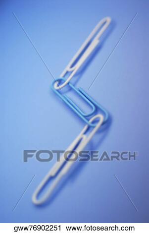 Close-up of three paper clips View Large Photo Image Stock Image - Close-up of three paper clips. Fotosearch