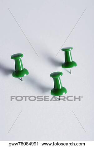 Close-up of three thumbtacks View Large Photo Image Stock Image - Close-up of three thumbtacks. Fotosearch