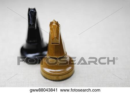 Close-up of two chess pieces View Large Photo Image Stock Image - Close-up of two chess pieces. Fotosearch