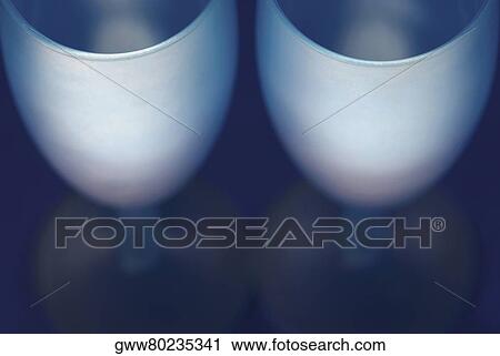 Close-up of two glasses View Large Photo Image Stock Image - Close-up of two glasses. Fotosearch
