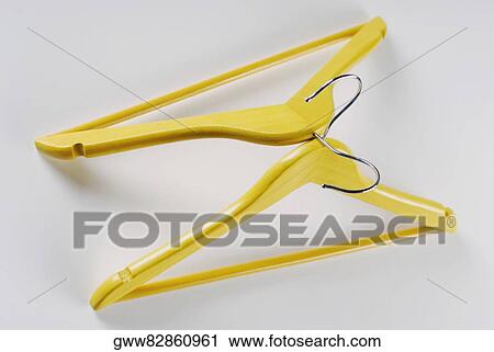 Stock Image - Close-up of two hangers. Fotosearch
