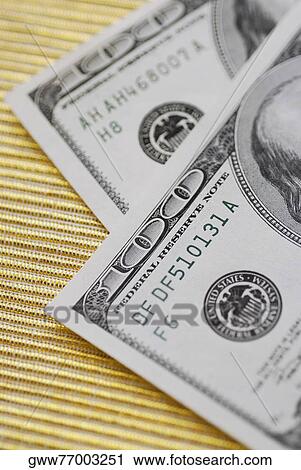Close-up of two one hundred dollar bills View Large Photo Image Stock Image - Close-up of two one hundred dollar bills. Fotosearch