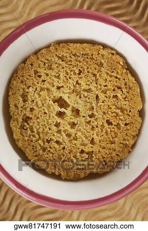 Stock Image - High angle view of a cookie in a bowl. Fotosearch