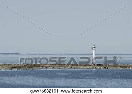Lighthouse on the beach View Large Photo Image Stock Image - Lighthouse on the beach. Fotosearch
