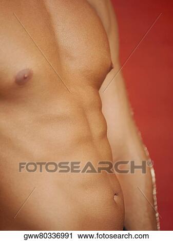 Mid section view of a man View Large Photo Image Stock Image - Mid section view of a man. Fotosearch