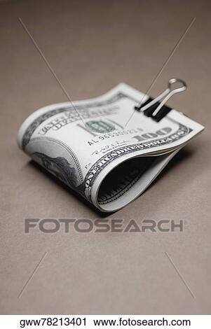 Paper clip attached to one hundred dollars bills View Large Photo Image Stock Image - Paper clip attached to one hundred dollars bills. Fotosearch