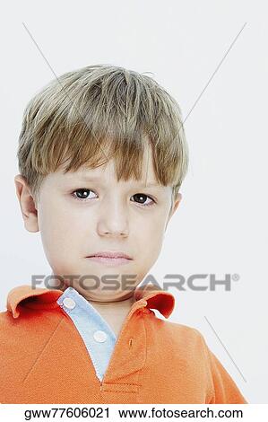 Stock Image - Portrait of a boy crying. Fotosearch