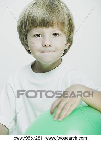 Portrait of a boy puckering View Large Photo Image Stock Image - Portrait of a boy puckering. Fotosearch