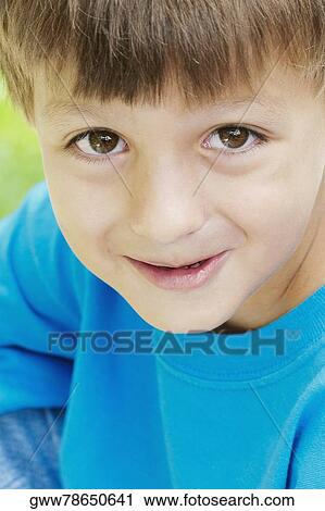 Portrait of a boy smiling View Large Photo Image Stock Image - Portrait of a boy smiling. Fotosearch