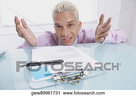 Portrait of a businessman gesturing View Large Photo Image Stock Image - Portrait of a businessman gesturing. Fotosearch