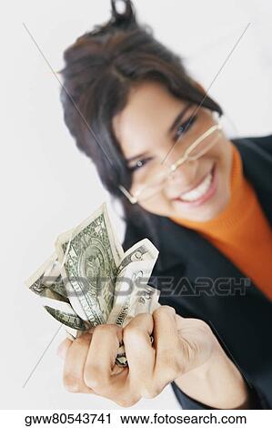 Portrait of a businesswoman crushing American dollar bills View Large Photo Image Stock Image - Portrait of a businesswoman crushing American dollar bills. Fotosearch