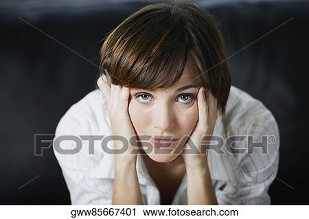 Portrait of a businesswoman looking worried View Large Photo Image Stock Image - Portrait of a businesswoman looking worried. Fotosearch