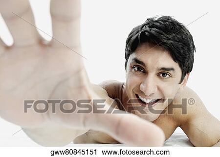 Portrait of a mid adult man making a stop gesture View Large Photo Image Stock Image - Portrait of a mid adult man making a stop gesture. Fotosearch