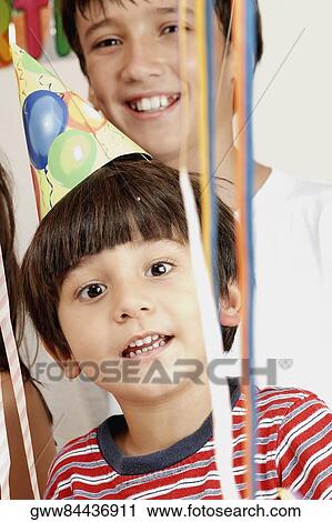 Portrait of two boys smiling View Large Photo Image Stock Image - Portrait of two boys smiling. Fotosearch