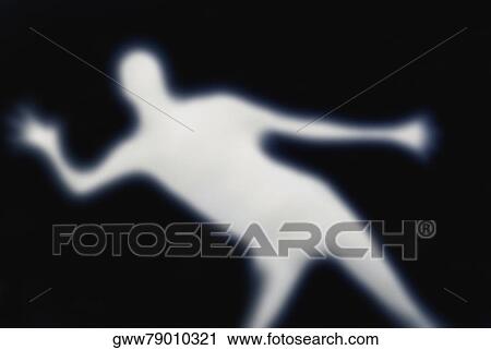 Stock Image - Silhouette of a person dancing. Fotosearch