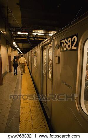 Subway train at a subway platform View Large Photo Image Stock Image - Subway train at a subway platform. Fotosearch