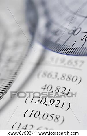 Two protractors on a financial document View Large Photo Image Stock Image - Two protractors on a financial document. Fotosearch
