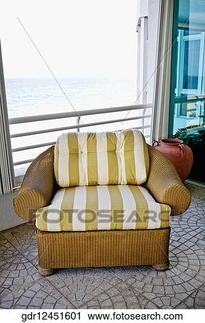 Stock Image - Armchair in a living room. Fotosearch