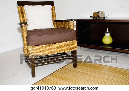 Stock Image - Armchair in a living room. Fotosearch