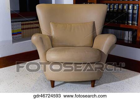 Stock Image - Armchair in a living room. Fotosearch