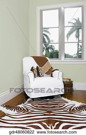 Stock Image - Armchair in a living room. Fotosearch