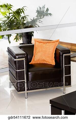 Stock Image - Armchair in a living room. Fotosearch