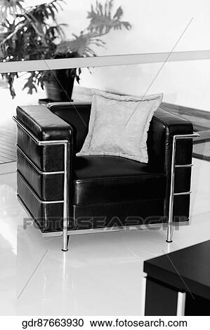 Stock Image - Armchair in a living room. Fotosearch