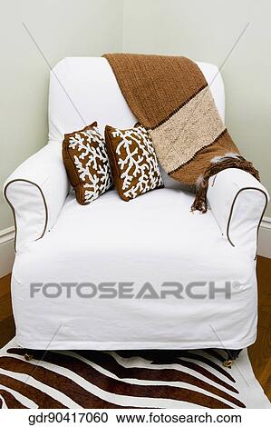 Armchair in a living room View Large Photo Image Stock Image - Armchair in a living room. Fotosearch