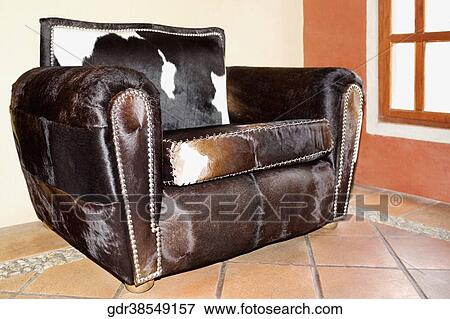 Armchair in a living room View Large Photo Image Stock Photo - Armchair in a living room. Fotosearch