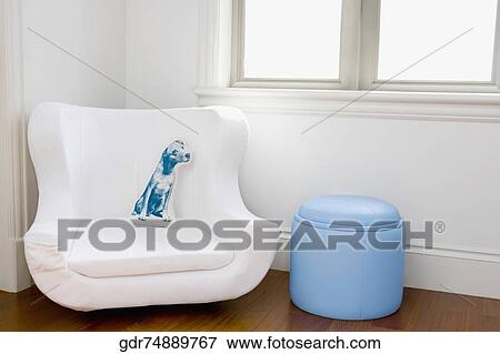 Armchair in a living room View Large Photo Image Stock Photo - Armchair in a living room. Fotosearch
