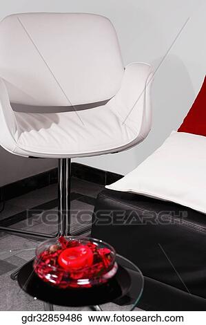 Armchair in a living room View Large Photo Image Stock Photograph - Armchair in a living room. Fotosearch