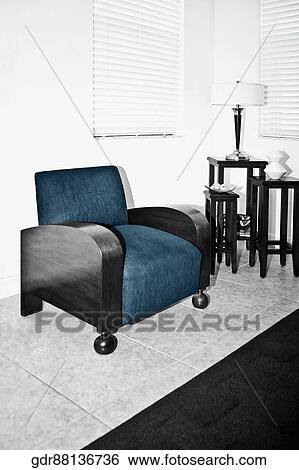 Armchair in a living room View Large Photo Image Stock Photograph - Armchair in a living room. Fotosearch